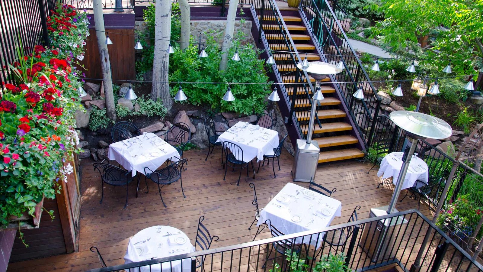 Grappa, an Italian restaurant in Park City: candlelit patio and timber dining room featured in the Cozy Method guide