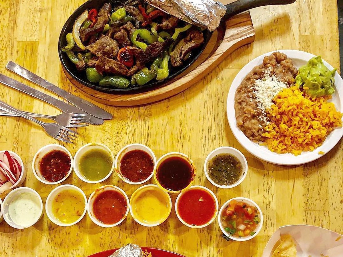 Cozy Method Park City Mexican restaurant guide: the salsa bar selection served alongside fajitas at El Chubasco in Park City