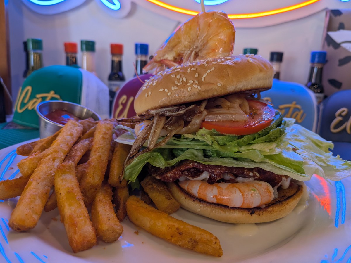 Cozy Method Park City Mexican restaurant guide: shrimp burger served under the El Cata neon at Sergio's in Park City