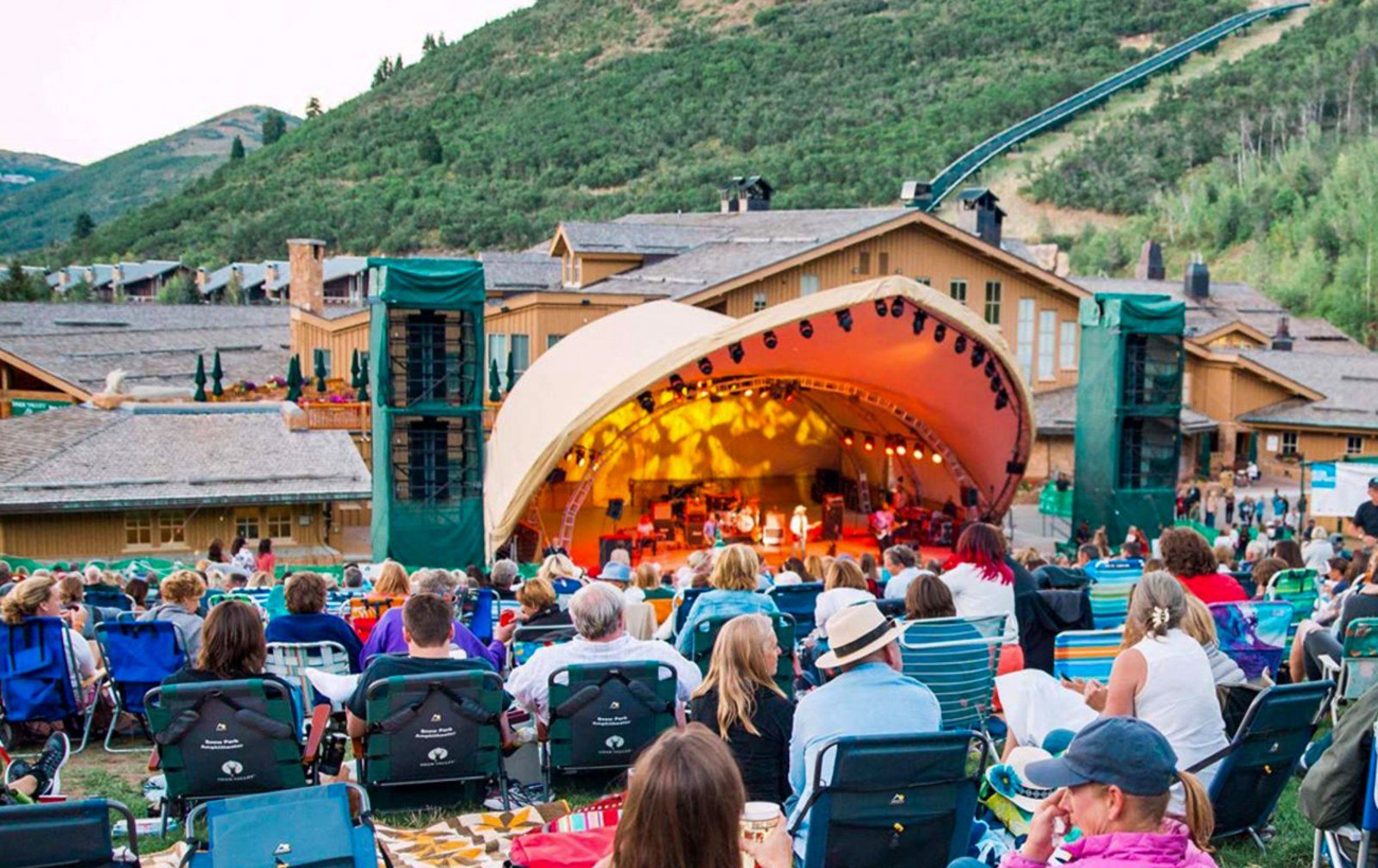 Cozy Method Park City experiences guide: lawn seating and blankets at an outdoor concert at Canyons Village, Park City