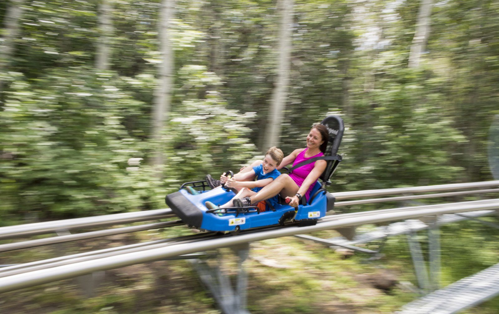 Cozy Method Park City experiences guide: the alpine coaster running through the snow at Park City Mountain