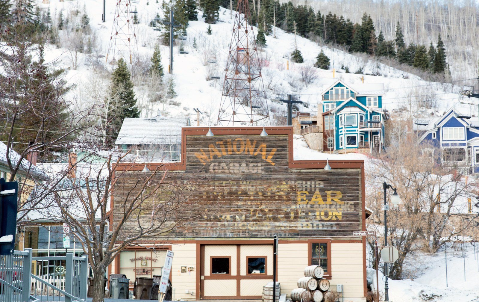 Cozy Method Park City experiences guide: snowy Historic Main Street in winter below the Park City Mountain slopes
