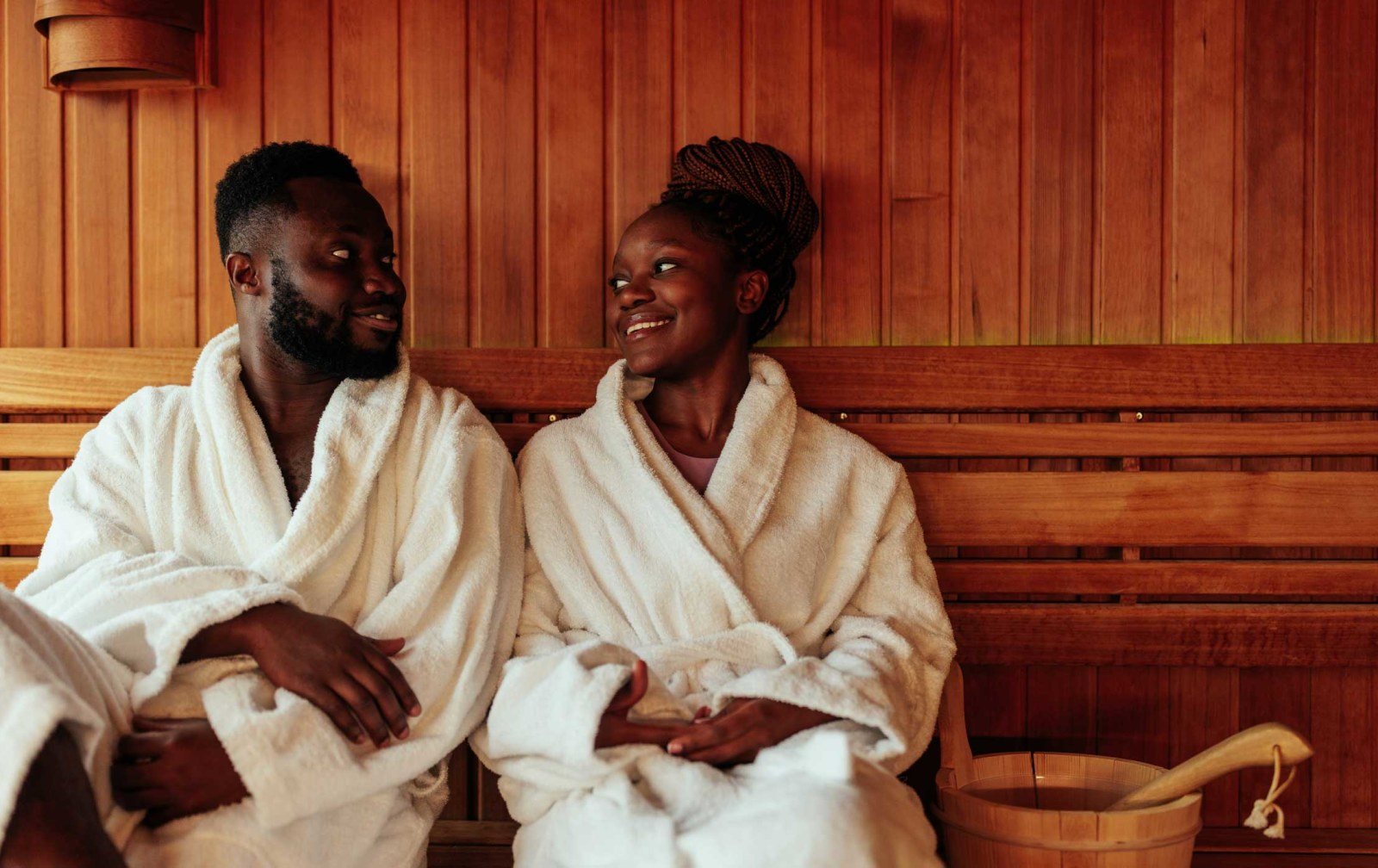 Cozy Method Park City spa guide: guests in robes relaxing in a warm sauna near Deer Valley, Park City