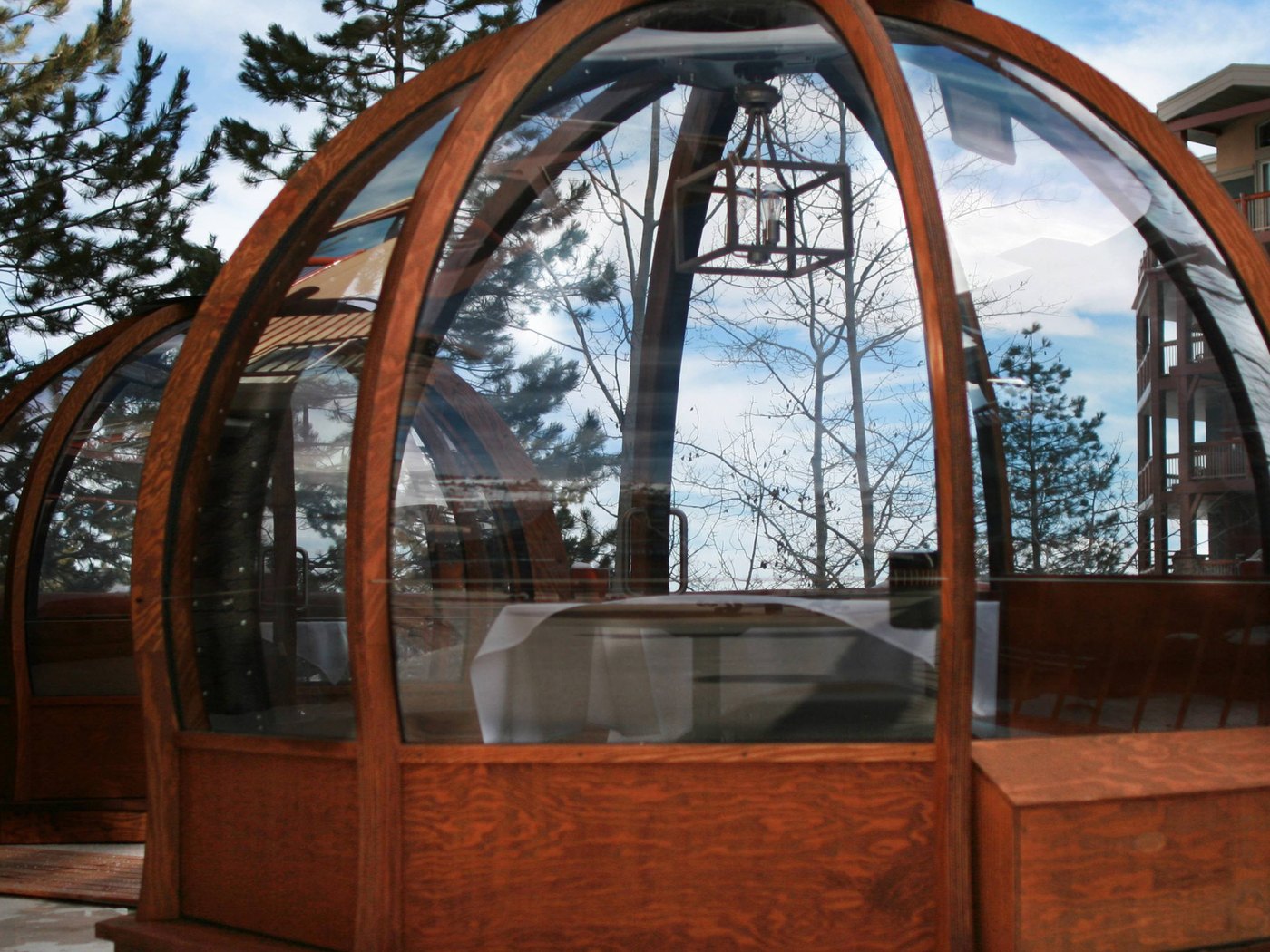 Cozy Method Park City steakhouse guide: the Edge 360 Alpenglobe private heated dining dome in the snow at Edge Steakhouse, Park City