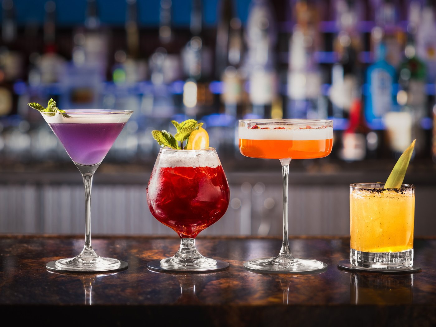 Cozy Method Park City steakhouse guide: a lineup of craft cocktails at the bar inside Edge Steakhouse in Canyons Village, Park City