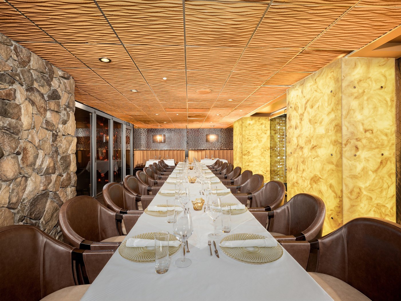 Cozy Method Park City steakhouse guide: the onyx-lit main dining room at Edge Steakhouse in Canyons Village, Park City