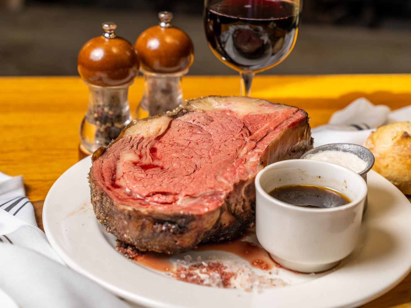 Cozy Method Park City steakhouse guide: an 18-hour slow-roasted prime rib with au jus at Grub Steak in Park City