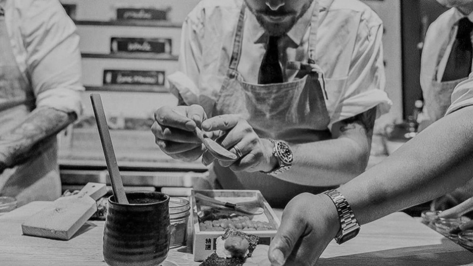 Cozy Method Park City sushi guide: chefs shaping nigiri at the ten-seat omakase counter of Sushi by Scratch Restaurants in Deer Valley