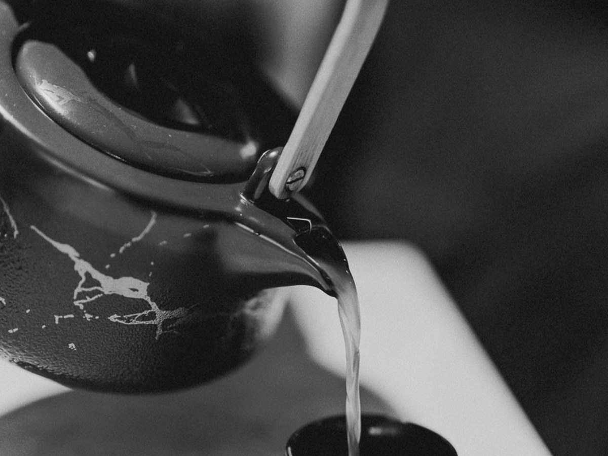 Cozy Method Park City sushi guide: sake poured during the omakase service at Sushi by Scratch Restaurants Park City