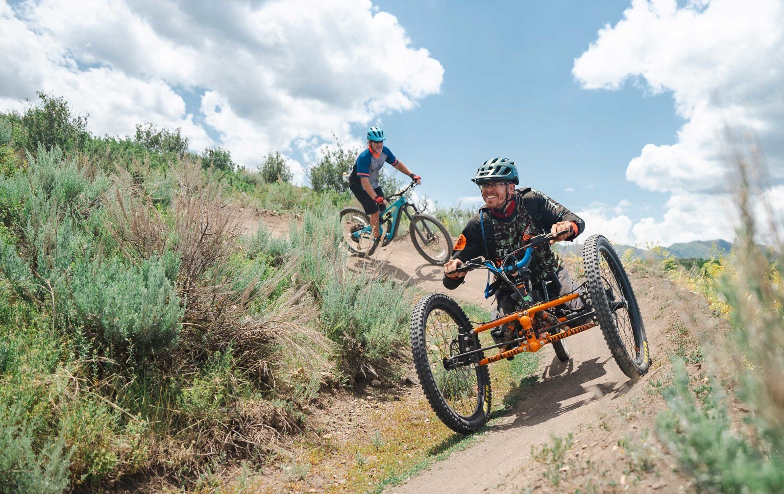 Cozy Method Park City experiences guide: a rider on singletrack progression trails near Woodward Park City