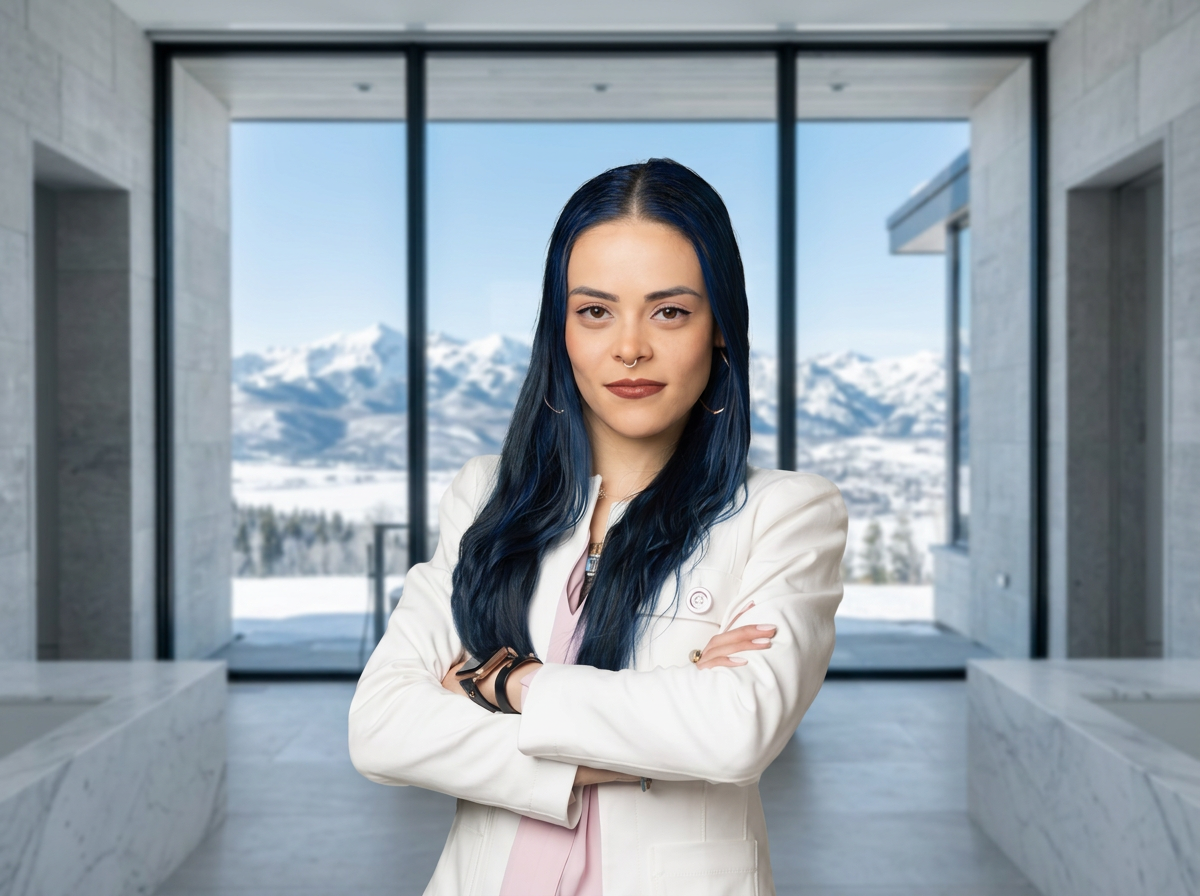 Dani inside a modern Promontory estate with snowy Wasatch mountain views